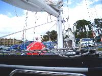 How can such a large red ball be so tiny in the water?