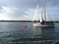 Finish line. Looks like 6 feet from this angle, but it was really 12 inches in favor of Island Girl. How's that for matched boats?
